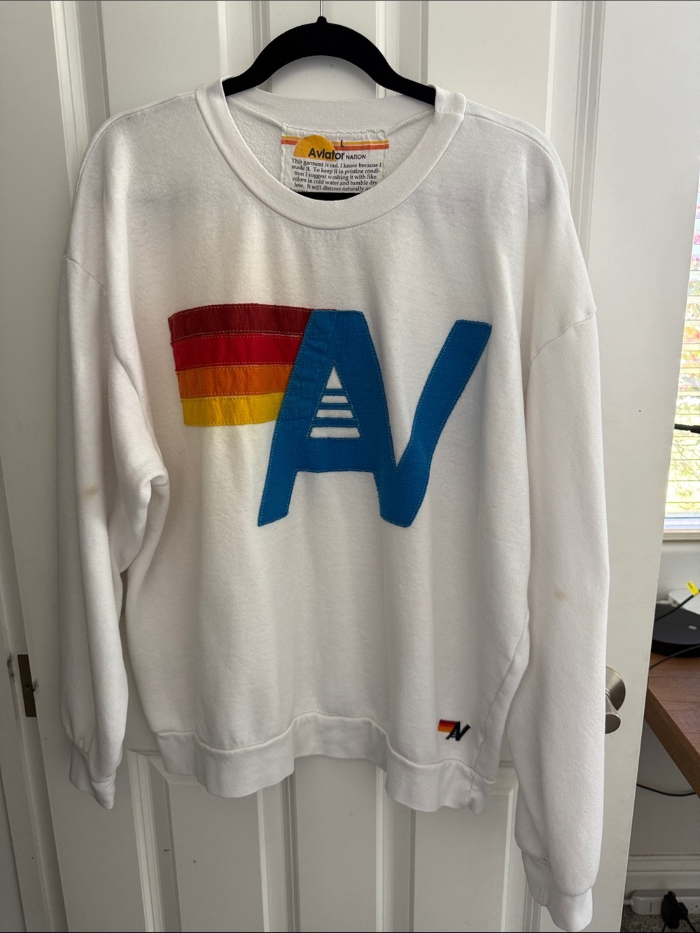 Aviator Nation White Crewneck with Blue Logo and Red-Orange-Yellow Stripes